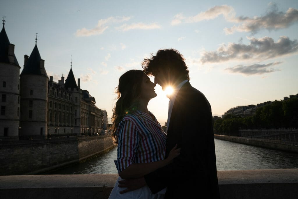 Romantic Paris evening engagement photos near Notre Dame