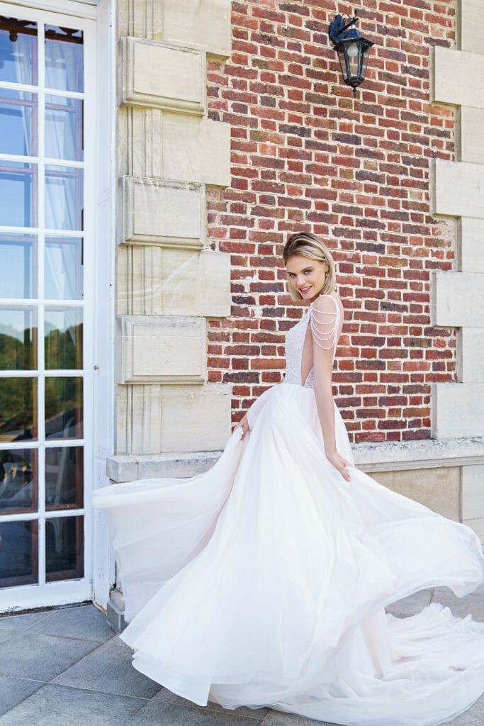 Beautiful bride's poses at Chateau Bouffemont Wedding gorgeous French Castle