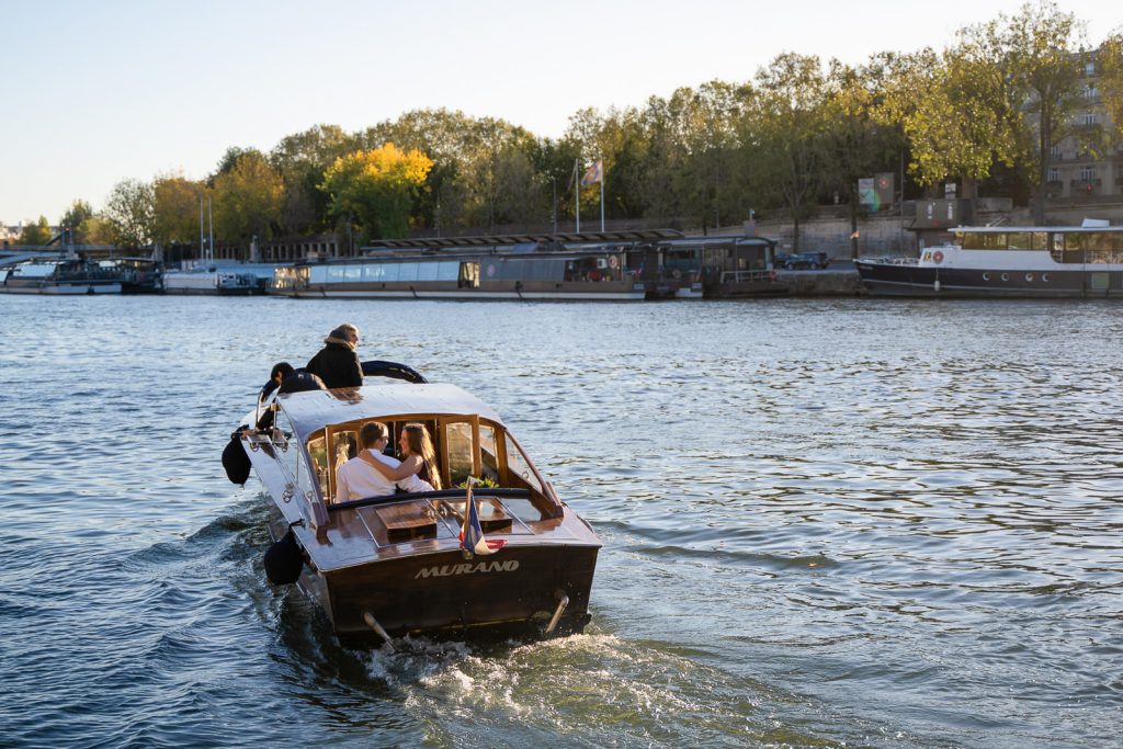 Paris proposal ideas with a boat on the Seine River near the Eiffel Tower