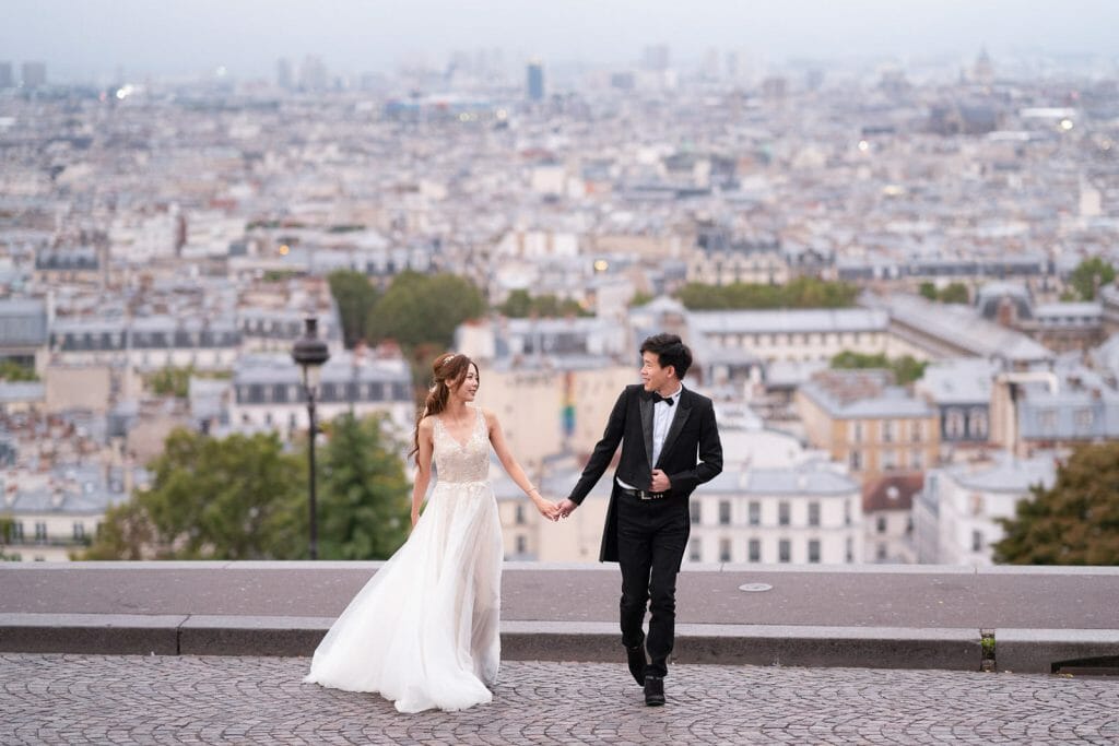 Stylish Paris pre-wedding photos at Montmartre below Sacre Coeur at sunrise