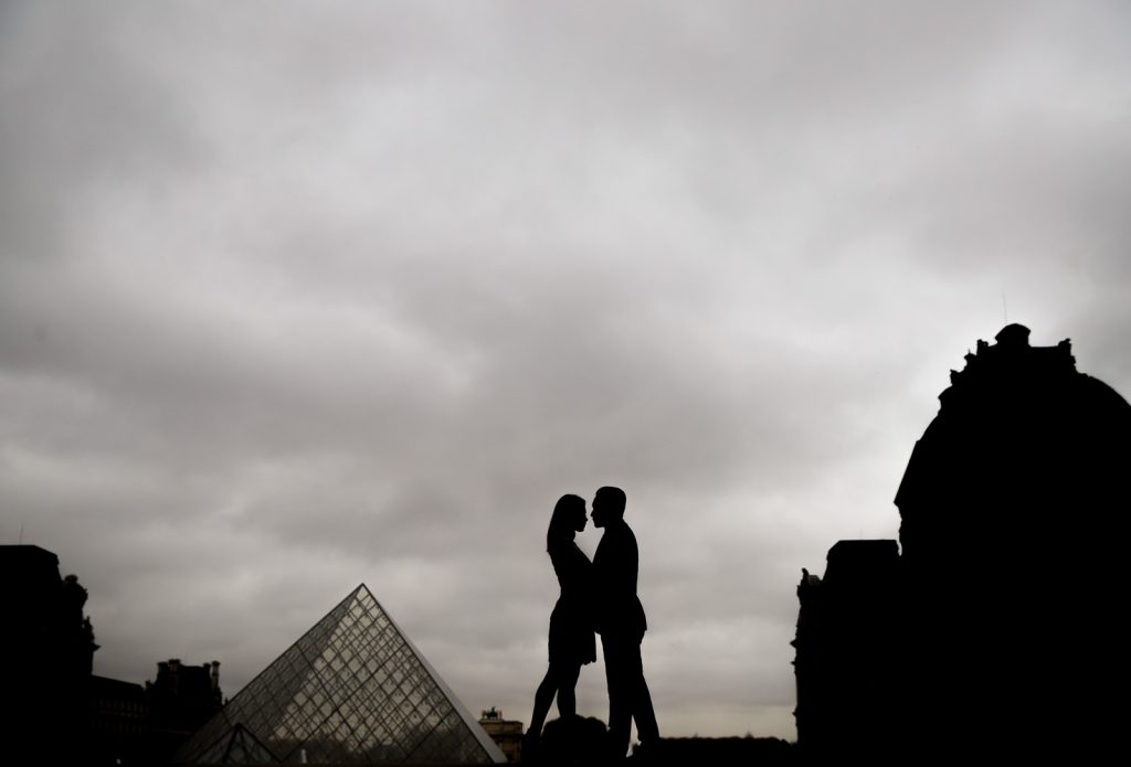 Unique Couple photoshoot in Paris stunning silhouette at the Louvre Museum