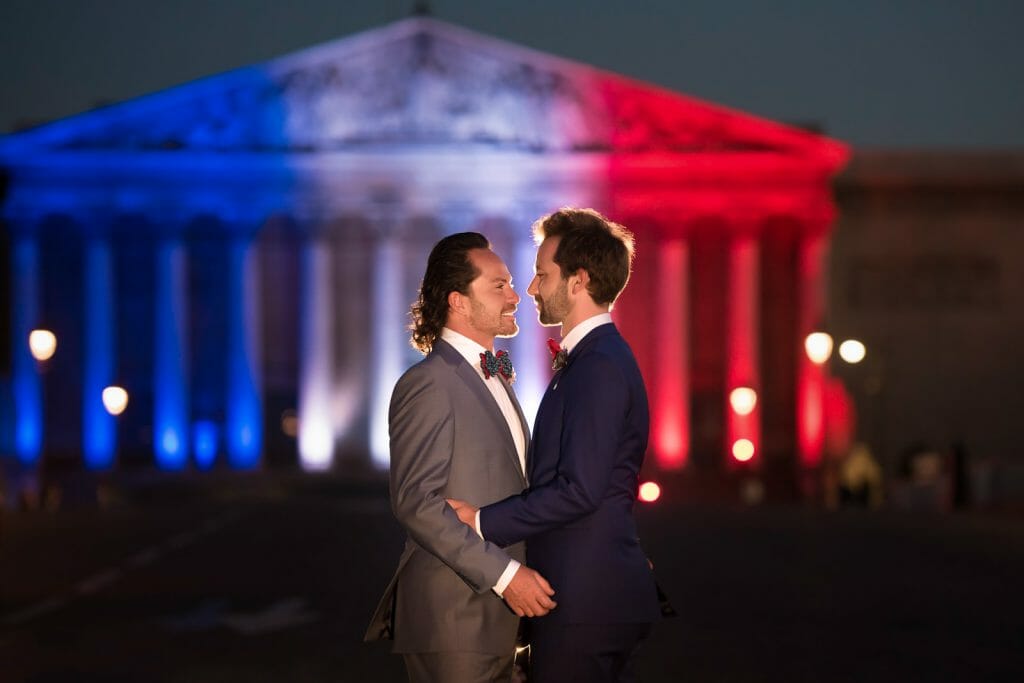 Same-sex nighttime Paris engagement photos
