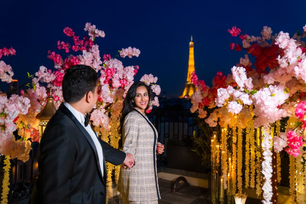 Dreamy Eiffel Tower couple photos at night on the Peninsula roof