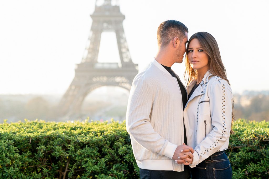 Eiffel Tower couple formal pose taken at Trocadero at sunrise
