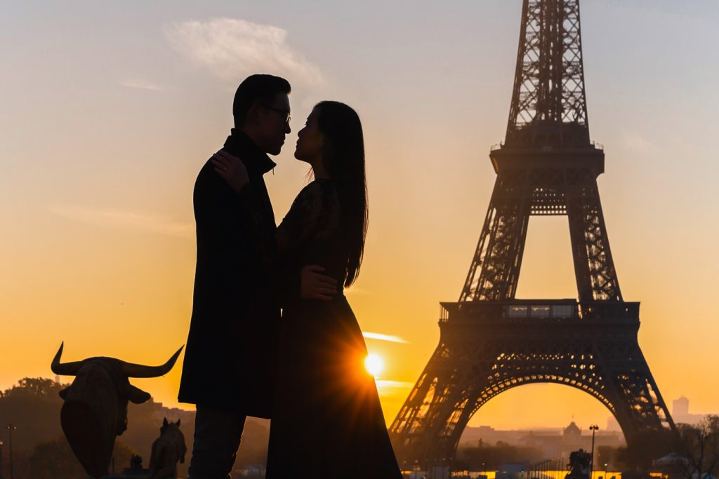 Eiffel Tower couple silhouette photo at sunrise at Trocadero