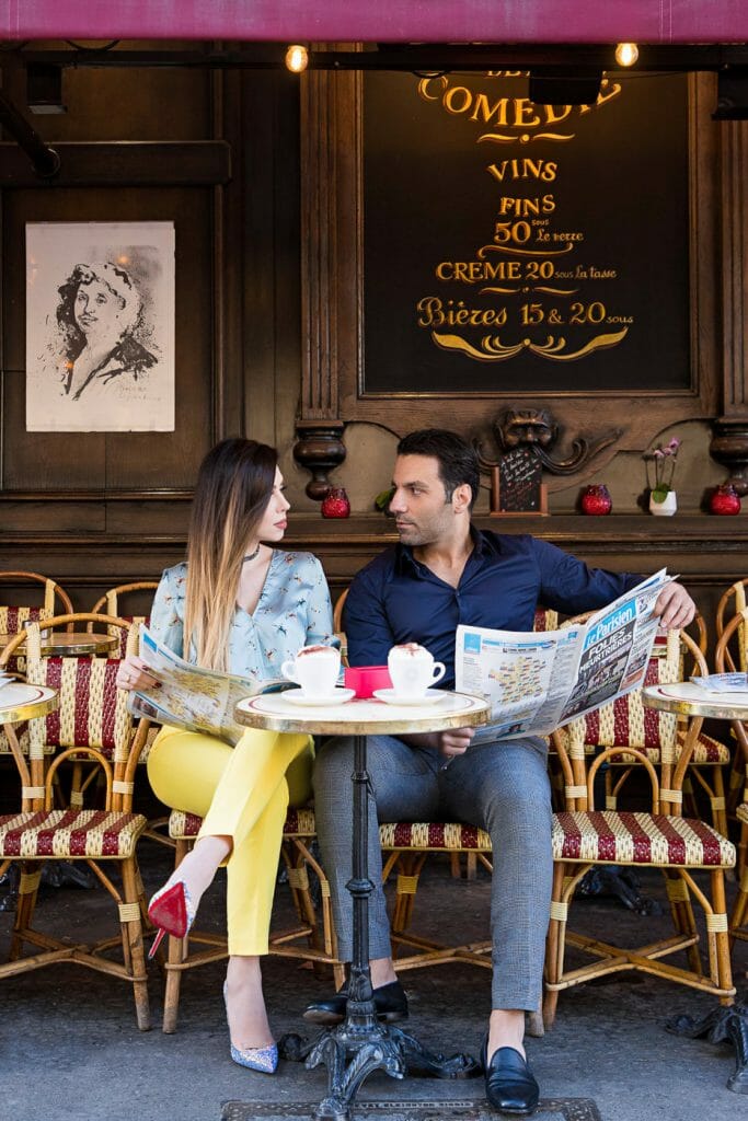 Couple photoshoot in Paris engagement photos in a Parisian cafe