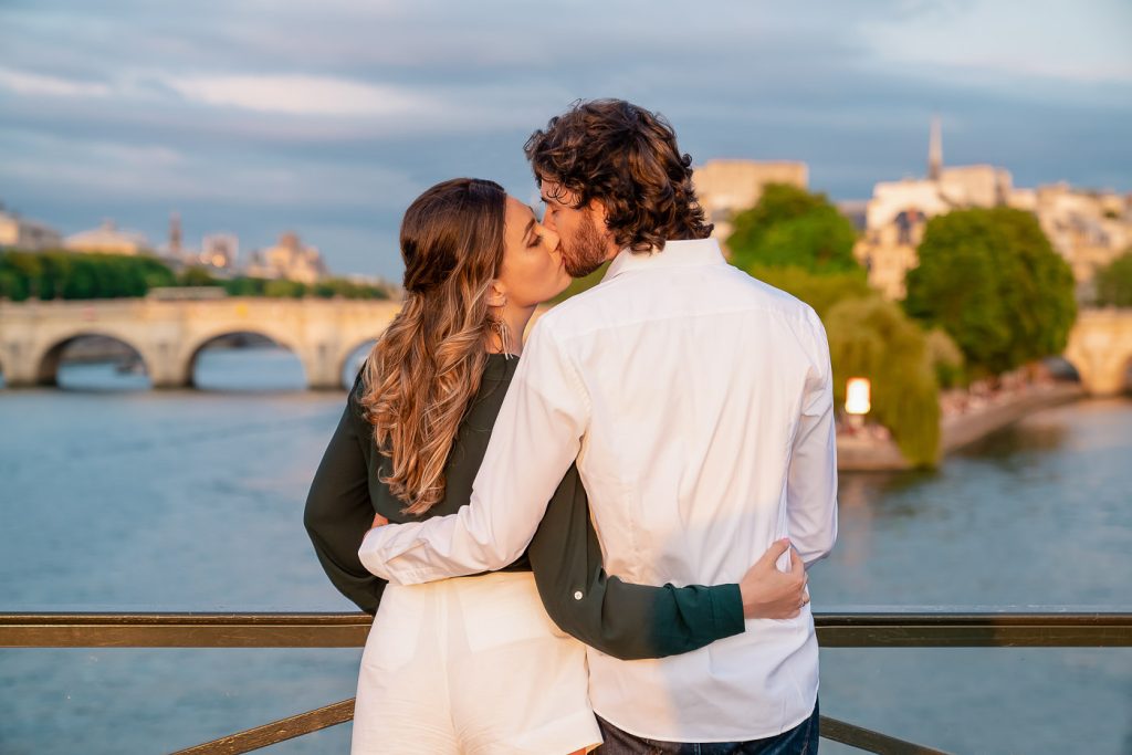 Romantic Paris evening photo on Pont des Arts