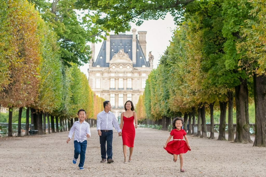 Natural-looking Professional Paris family photos in the Tuileries Gardens