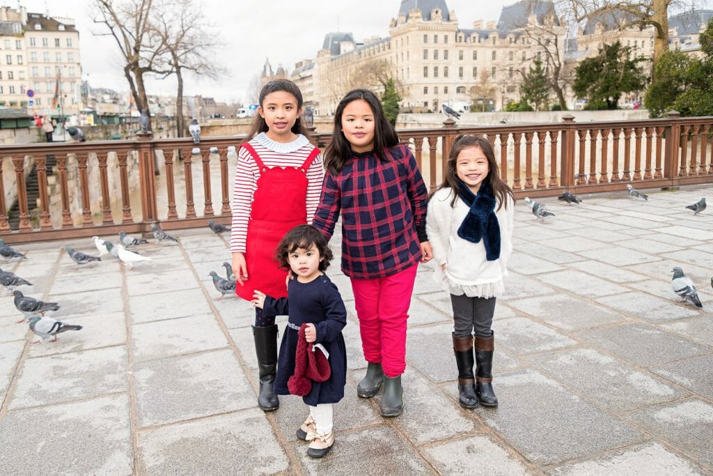 Natural looking Professional Paris family photos near Notre Dame