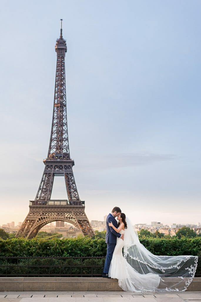 paris pre wedding photographer whimsical Eiffel Tower couple photos at sunrise at Trocadero