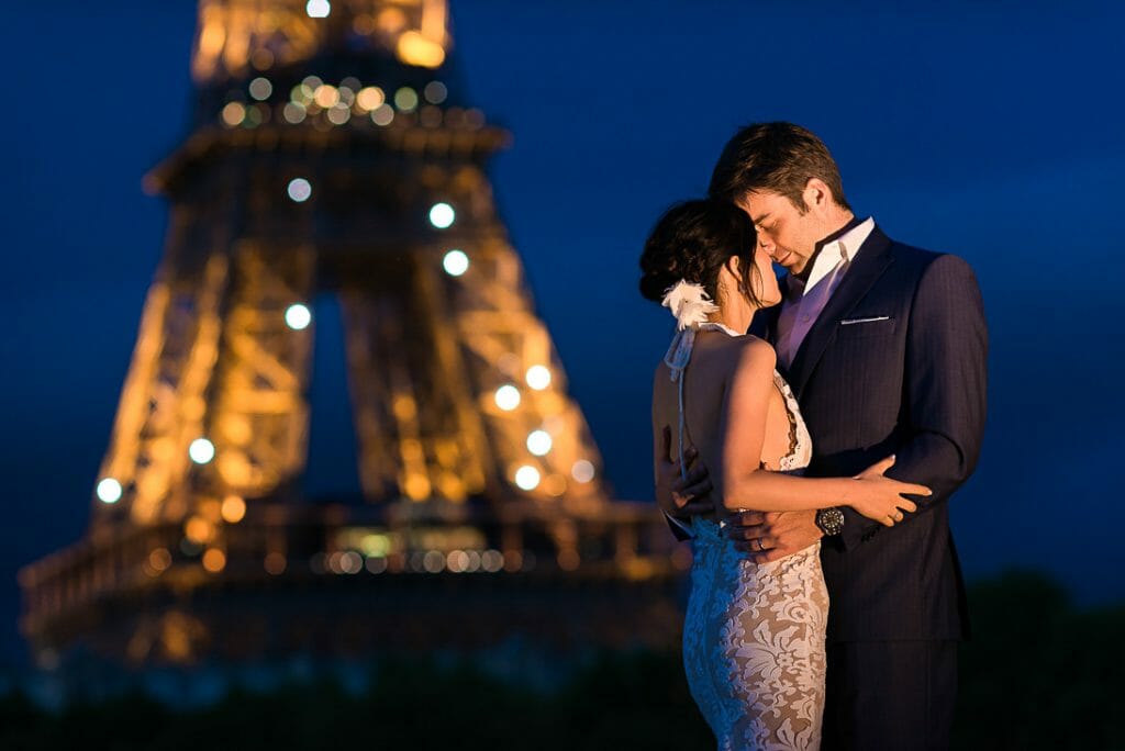 paris pre wedding photographer Romantic Eiffel Tower couple photoshoot at Bir Hakeim Bridge during the Blue Hour