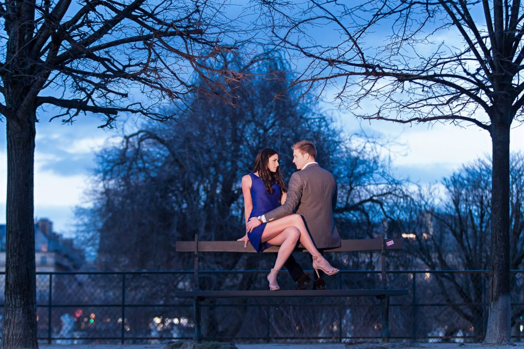 Romantic Paris engagement photos Tuileries Gardens during Blue Hour