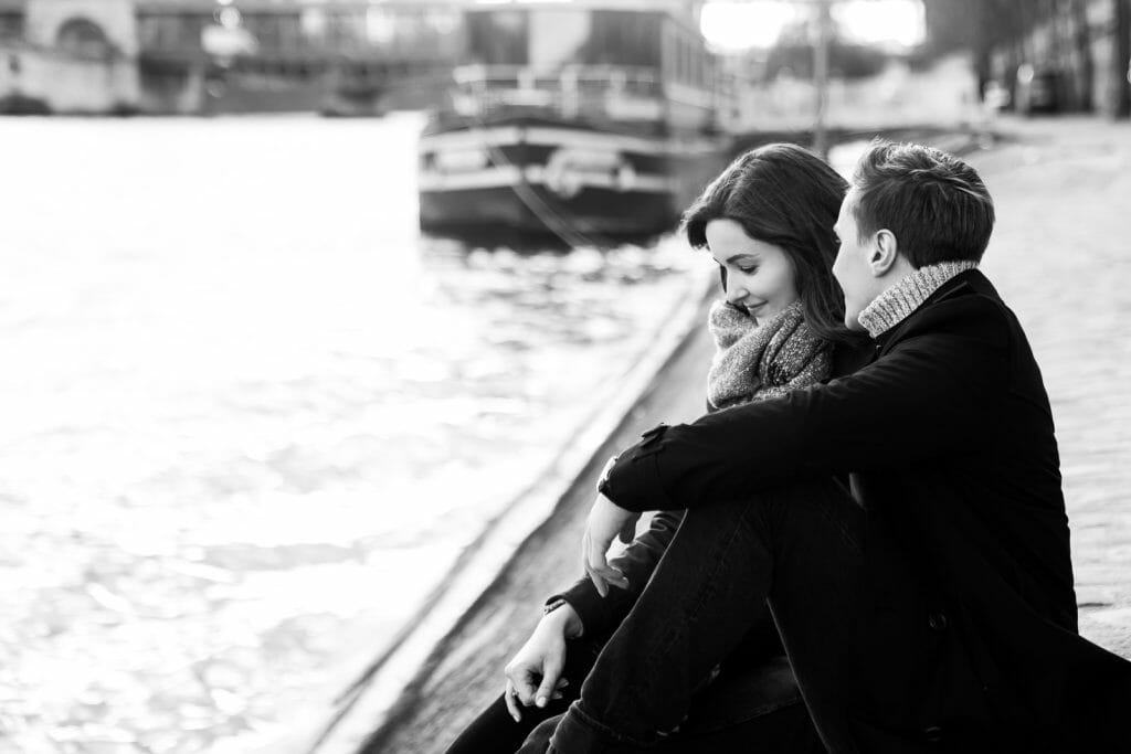 Paris engagement photos at the Seine River with Eiffel Tower view