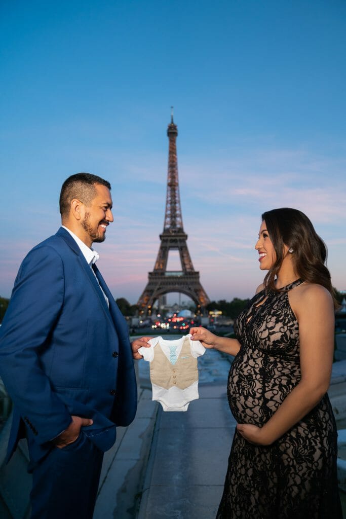 Paris family photos at the Eiffel Tower Maternity shoot with baby reveal
