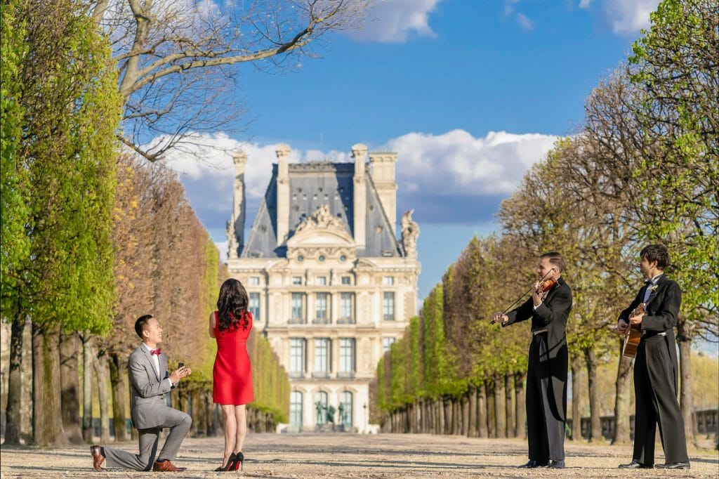 Tuileries Gardens Paris surprise proposal with musicians