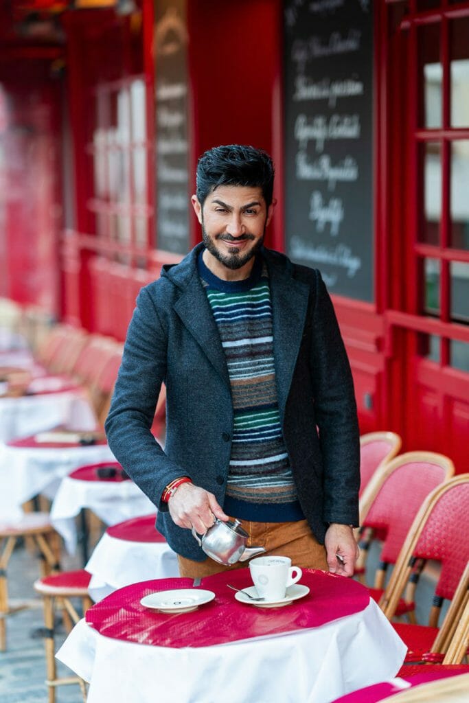 Solo traveler Paris portraits at a cafe in Montmartre