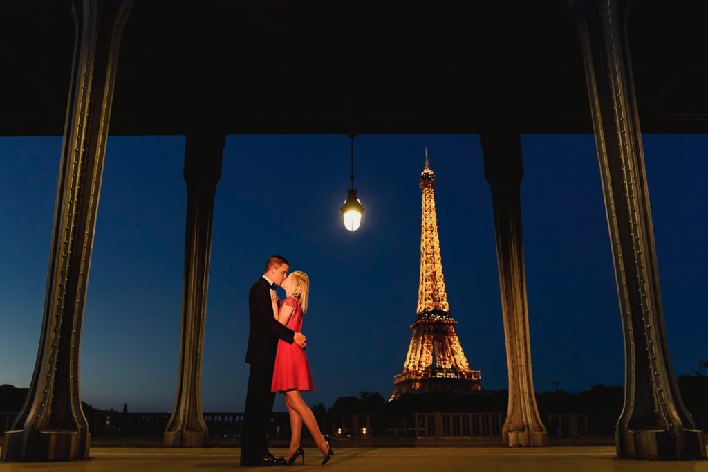 Romantic Eiffel Tower couple photos during Blue Hour Bir Hakeim Bridge