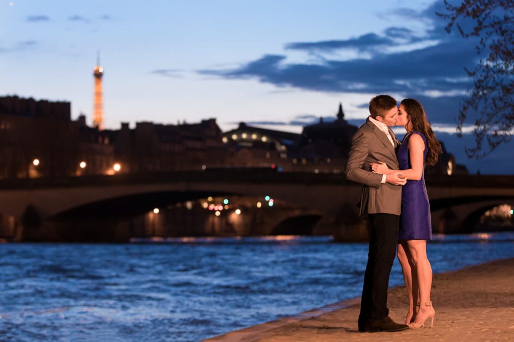 Romantic couple photos along Seine at night