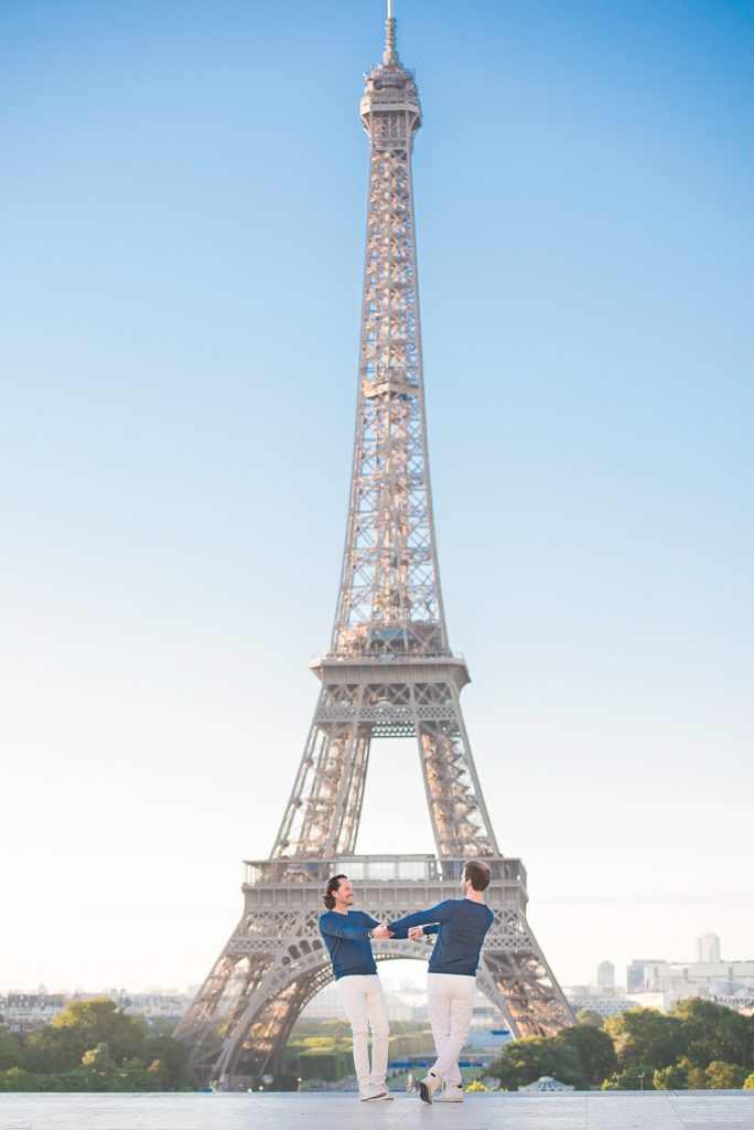 Same sex Eiffel Tower couple pictures taken at Trocadero at sunrise
