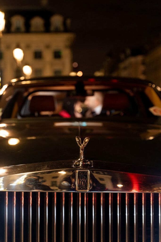 Romantic Peninsula Hotel Paris Proposal kissing in a Rolls-Royce