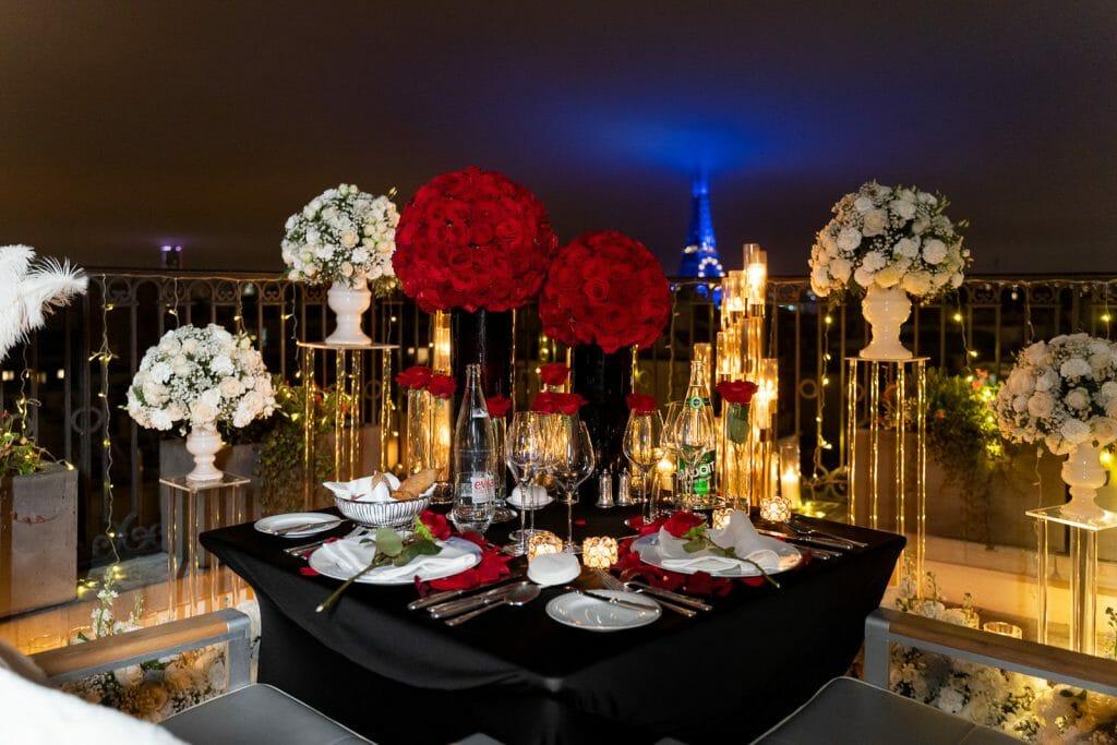 Winter-white Peninsula Hotel Paris Proposal ideas with Eiffel Tower sparkling in blue
