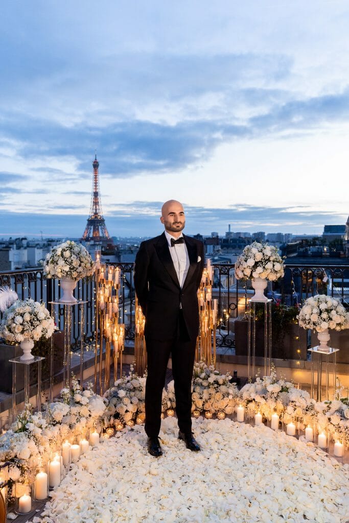 Epic Peninsula Hotel Paris Proposal with candles and white roses