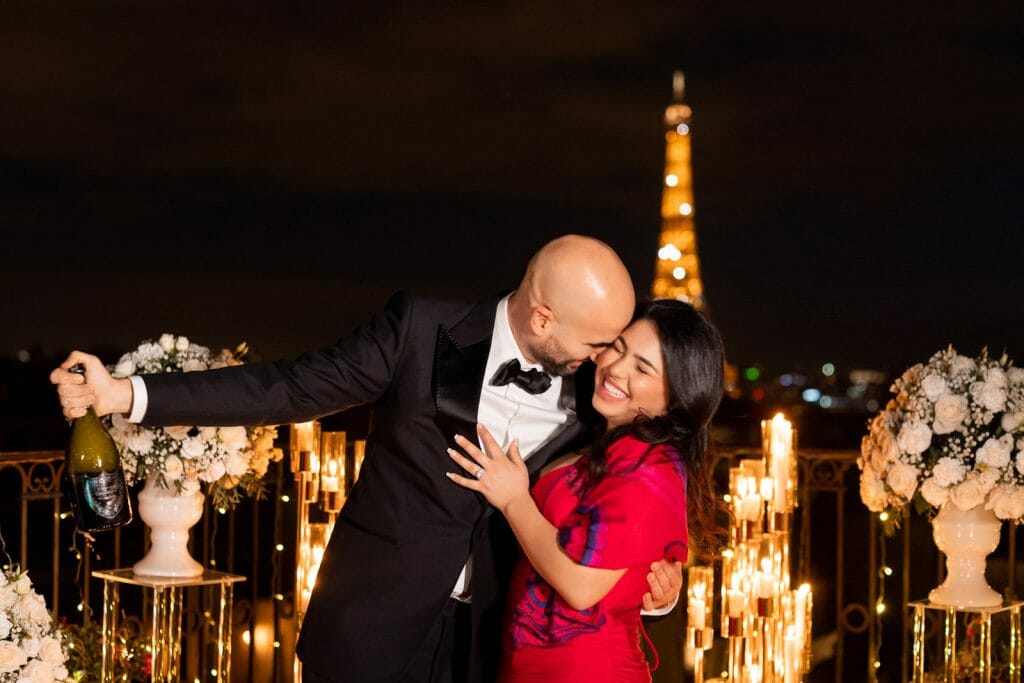 Amazing Peninsula Hotel Paris Proposal with Champagne pop while Eiffel Tower is sparkling