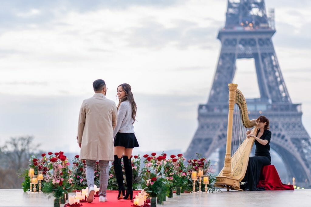 Eiffel Tower marriage proposal at Trocadero at sunrise with a harpist and luxury setting