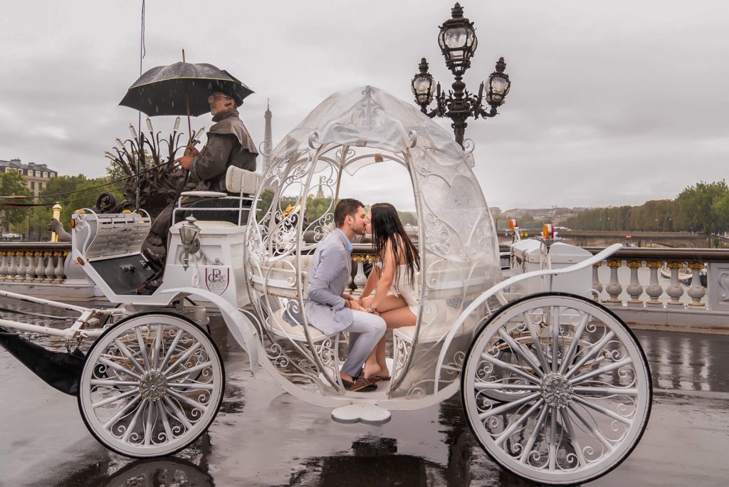Horse carriage marriage proposal in the rain in Paris
