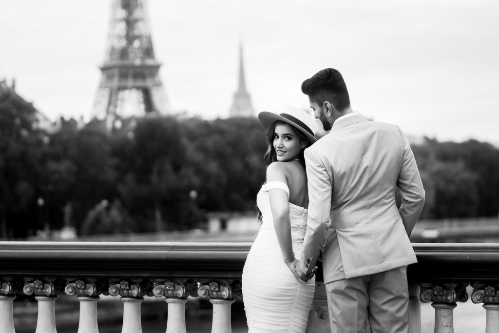 Romantic Paris engagement photos with Eiffel Tower view from Alexander III Bridge