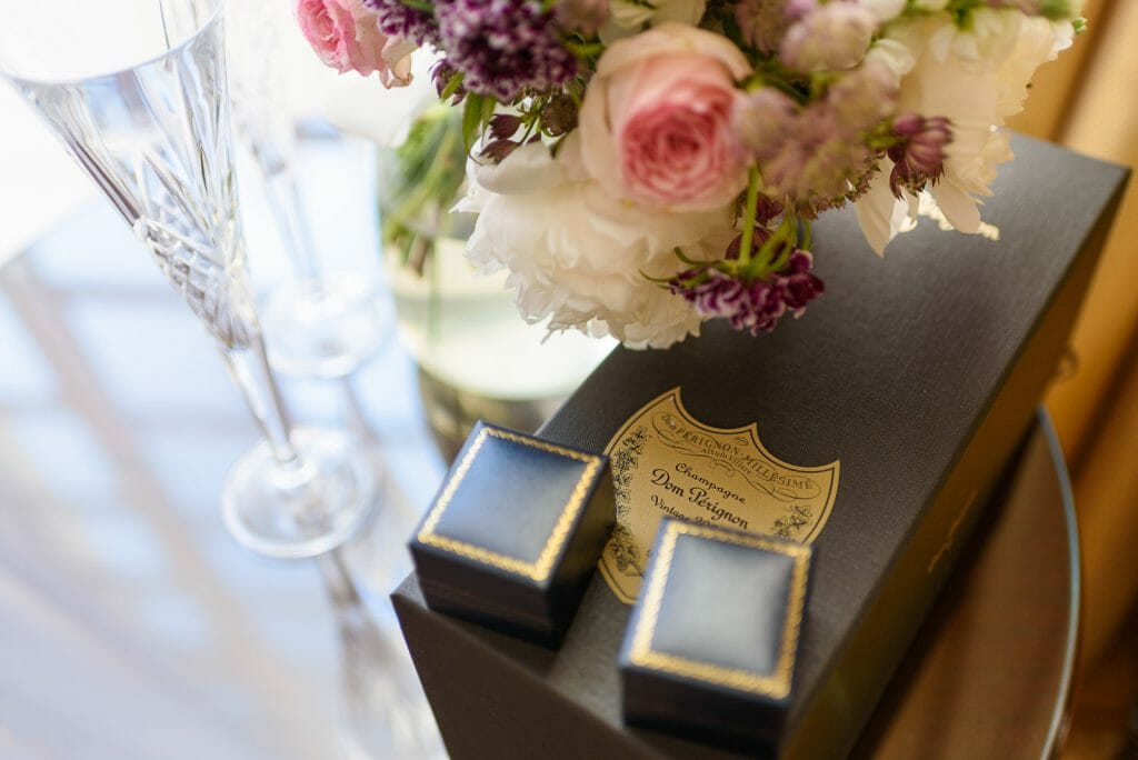 wedding rings and champagne for Paris elopement Shangri la