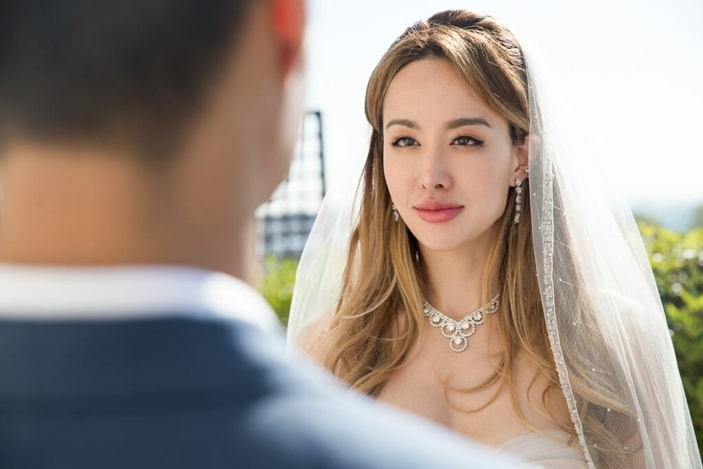 Bride staring at groom in Shangri la Paris elopement