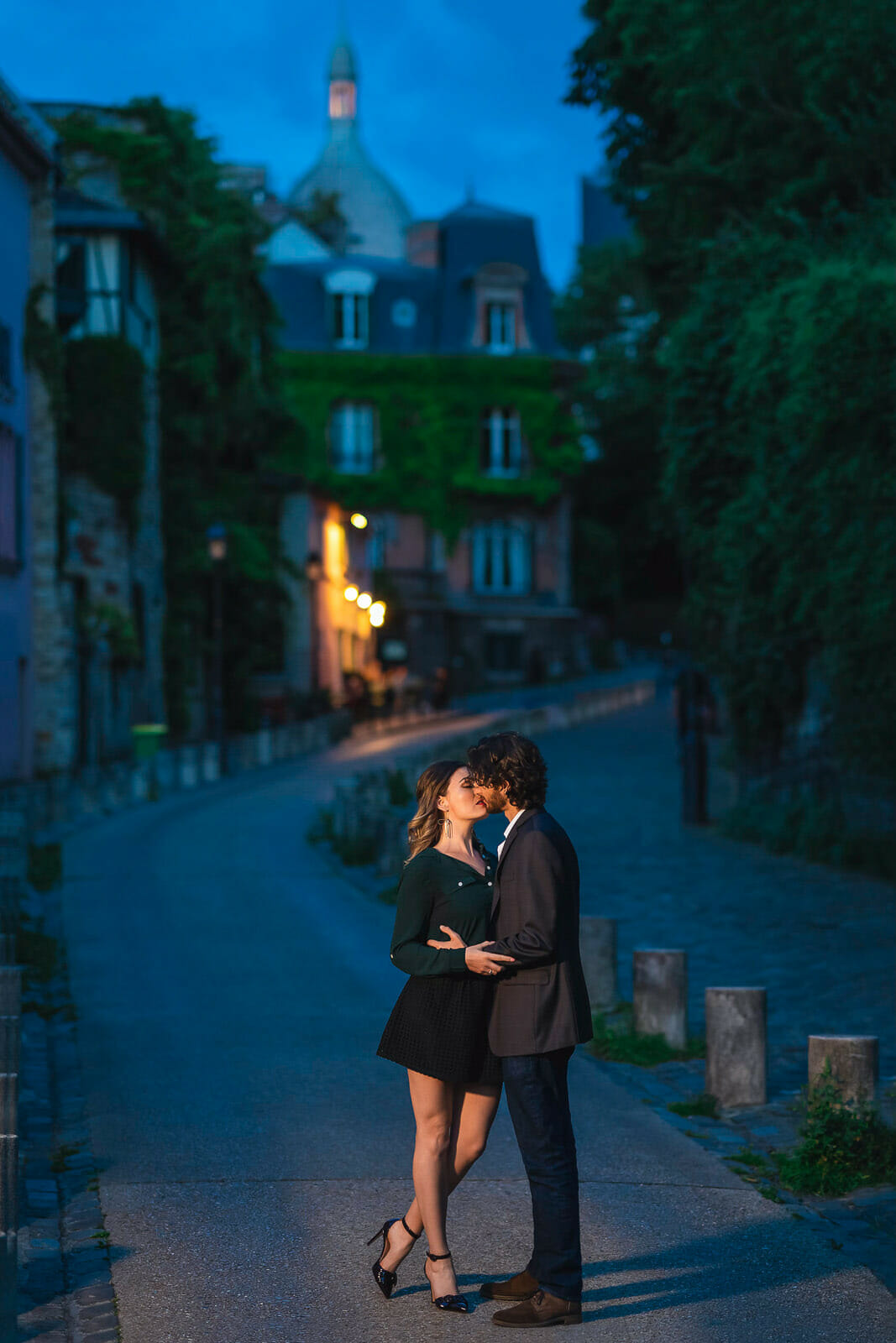 Romantic nighttime Paris proposal at Montmartre
