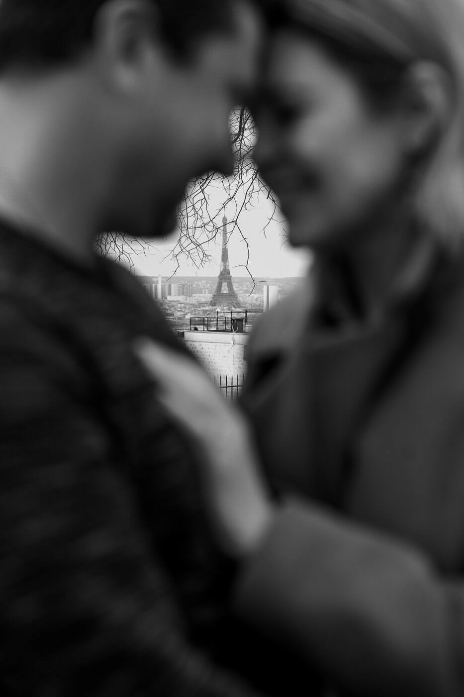 Creative Paris engagement photos with Eiffel Tower as focus