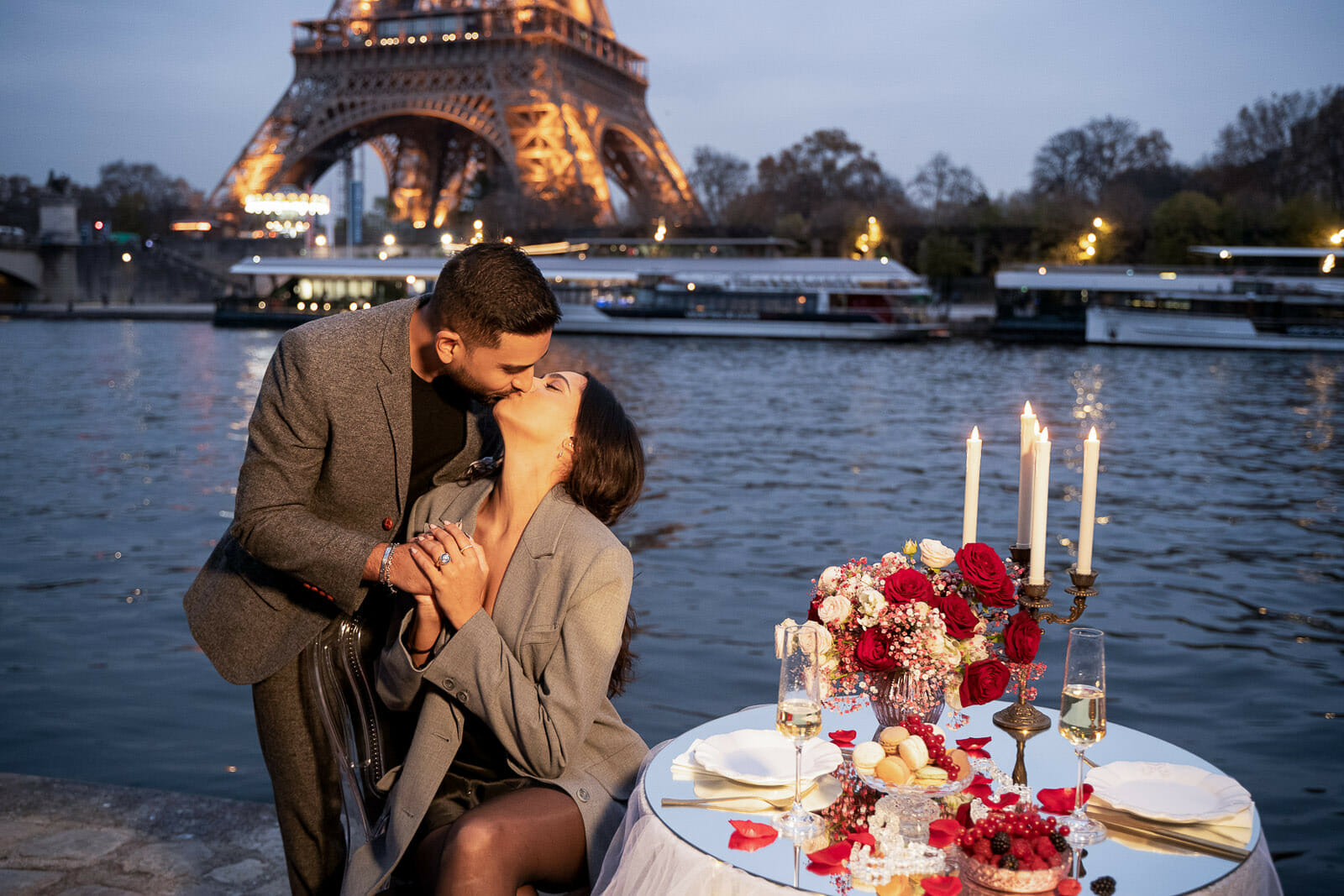 Paris proposal photos taken at night in front of the Eiffel Tower