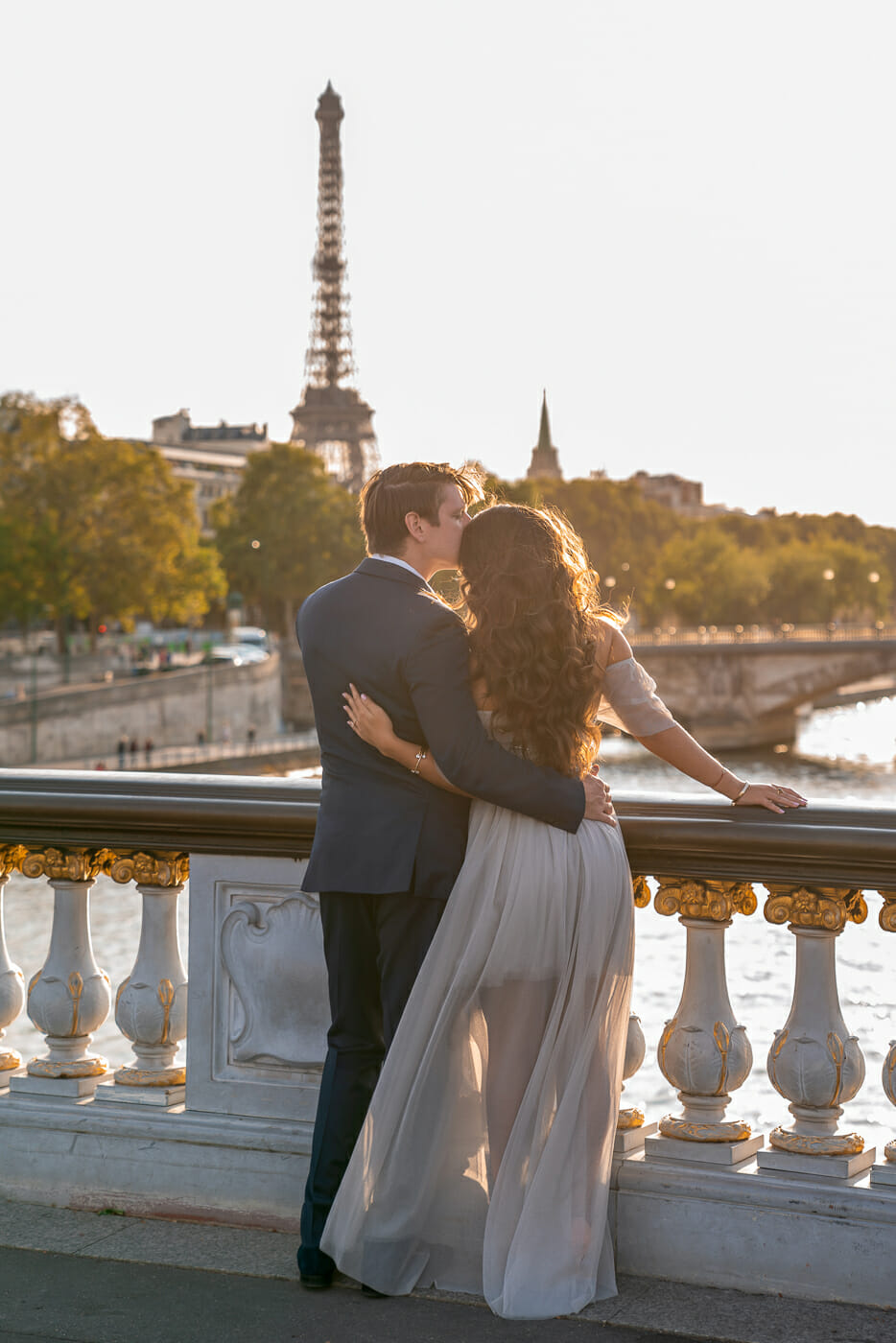 Romantic Paris engagement photos Alexander III Bridge evening