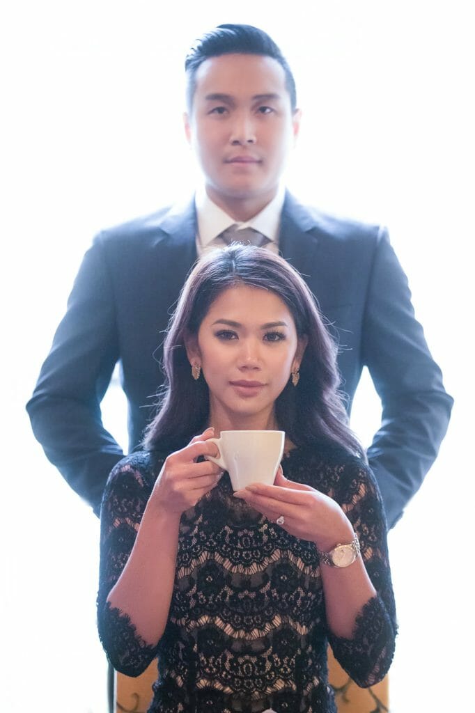 Creative couple portrait at Au Vieux Paris d’Arcole Cafe with Notre