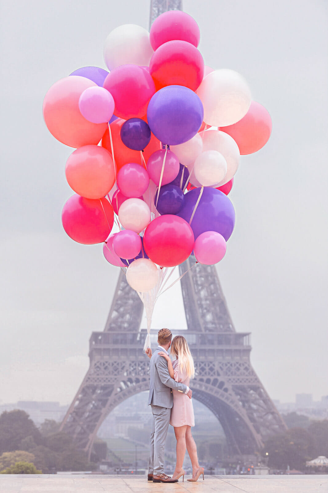 Amazing balloons as prop for Eiffel Tower couple photoshoot