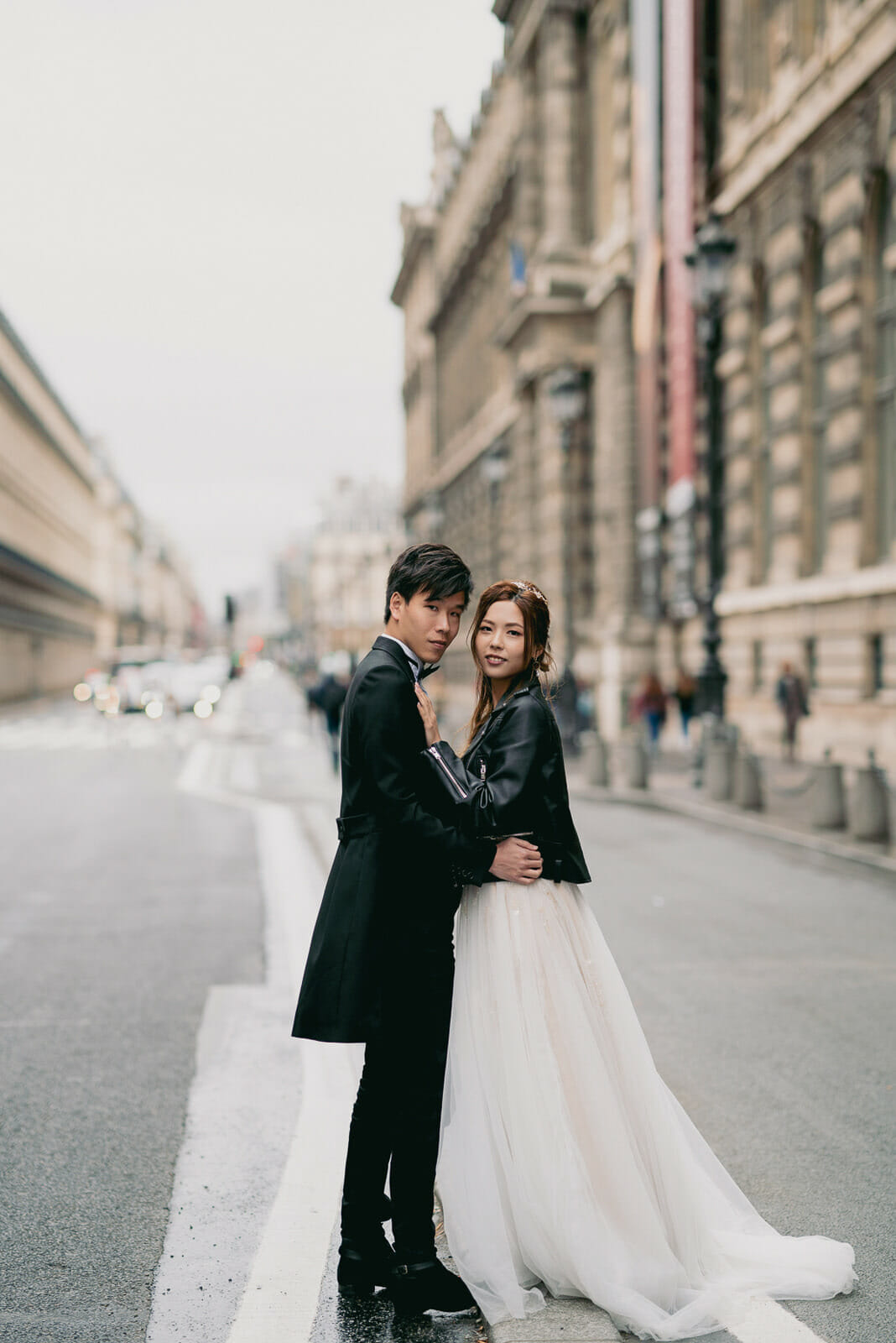 Fashionable couple pre-wedding photoshoot near the Louvre