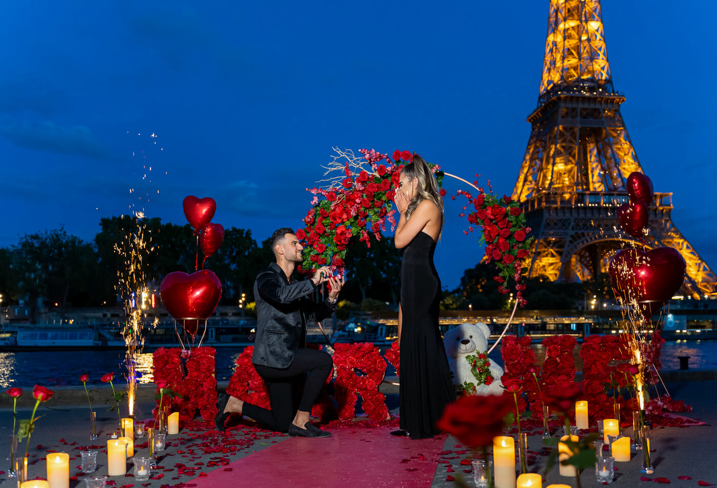 Luxury Paris proposal at the Eiffel Tower at night