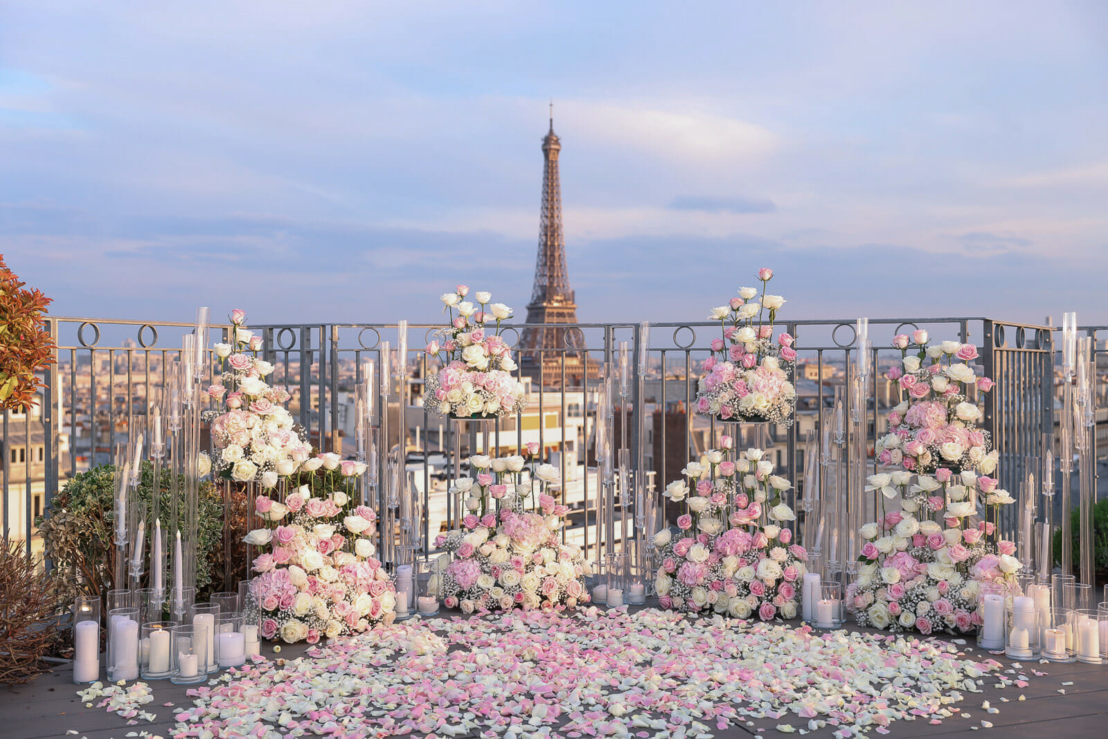 Luxury Paris proposal on a private rooftop with chilled Champagne and stunning decor