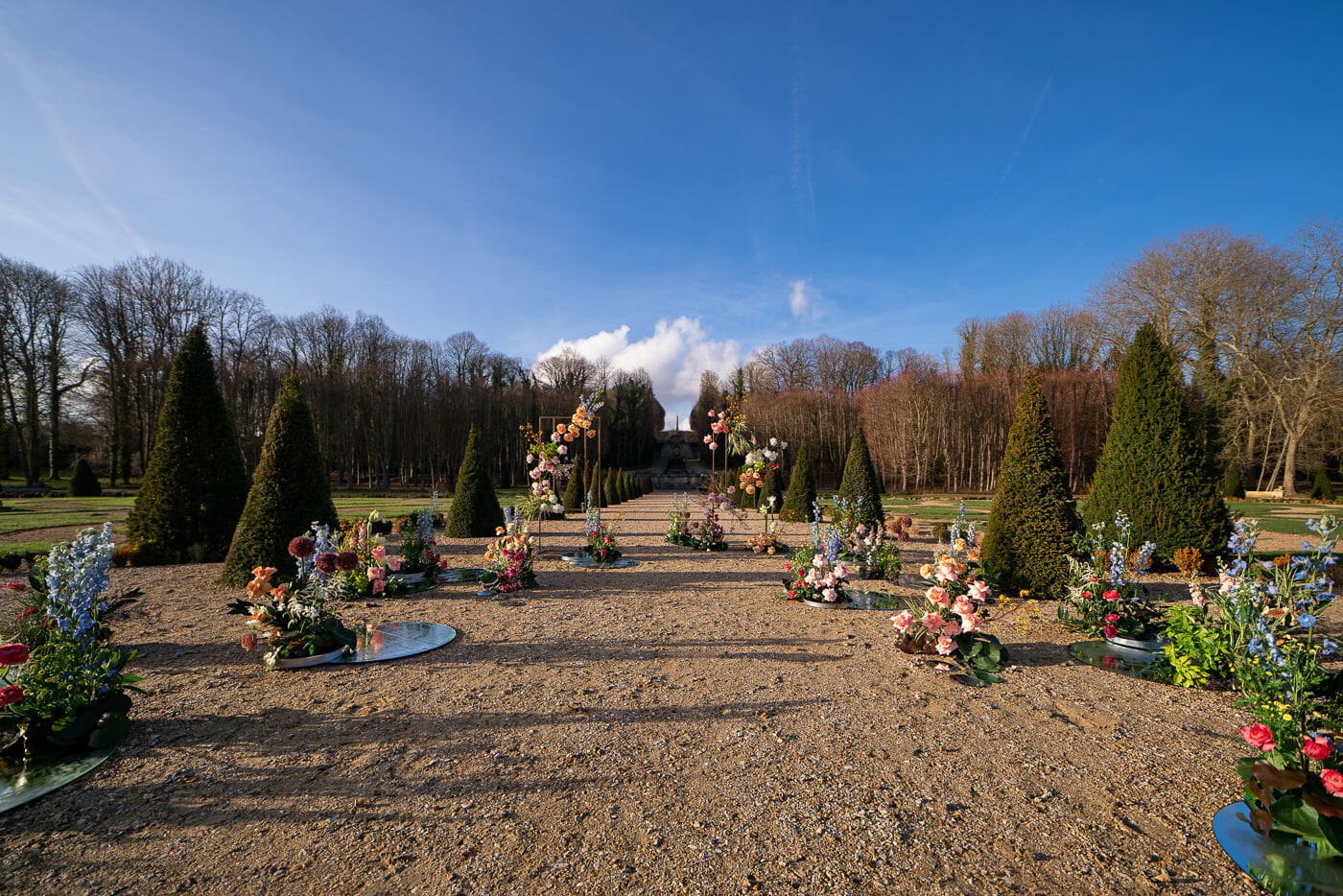 Fairytale marriage proposal setting with colorful floral design at Chateau de Villette in Paris