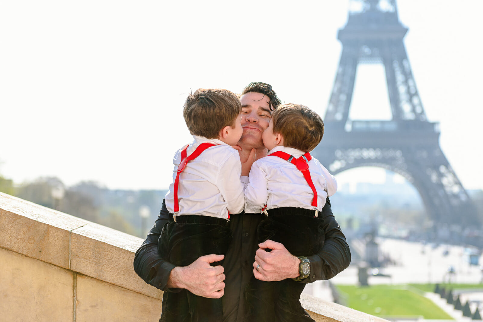 Dad with sons Professional Paris family portraits at Trocadero Eiffel Tower