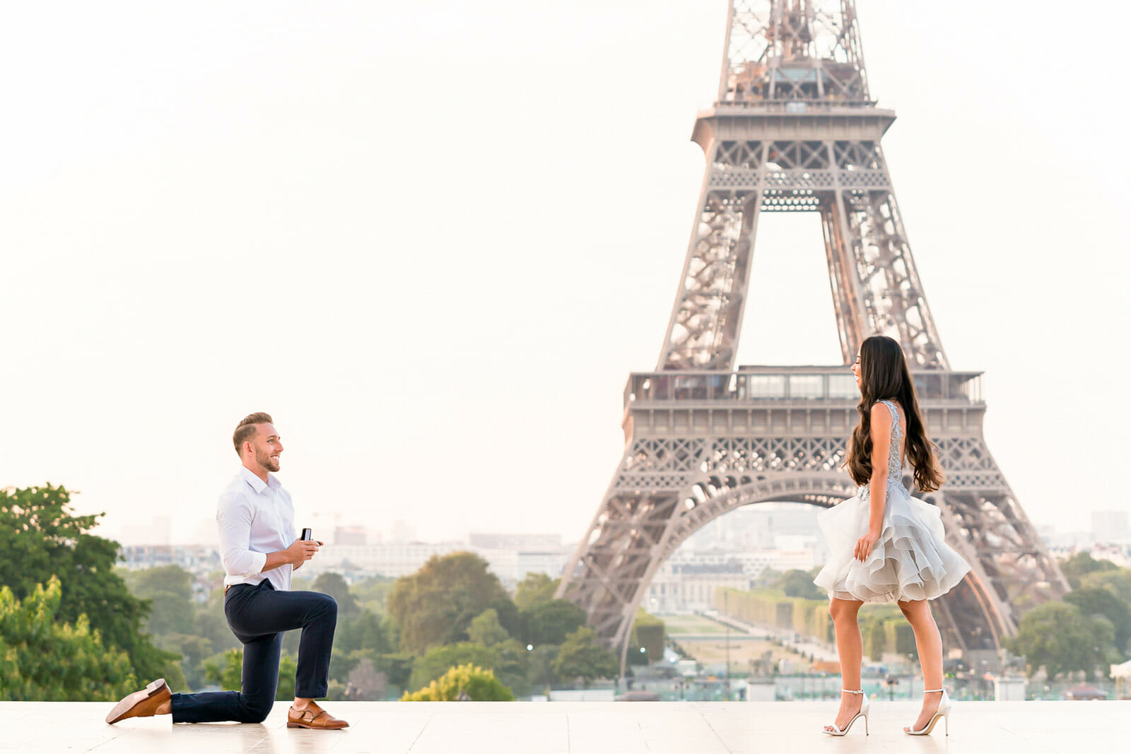 Surprise marriage proposal at the Eiffel Tower at sunrise by Cengiz