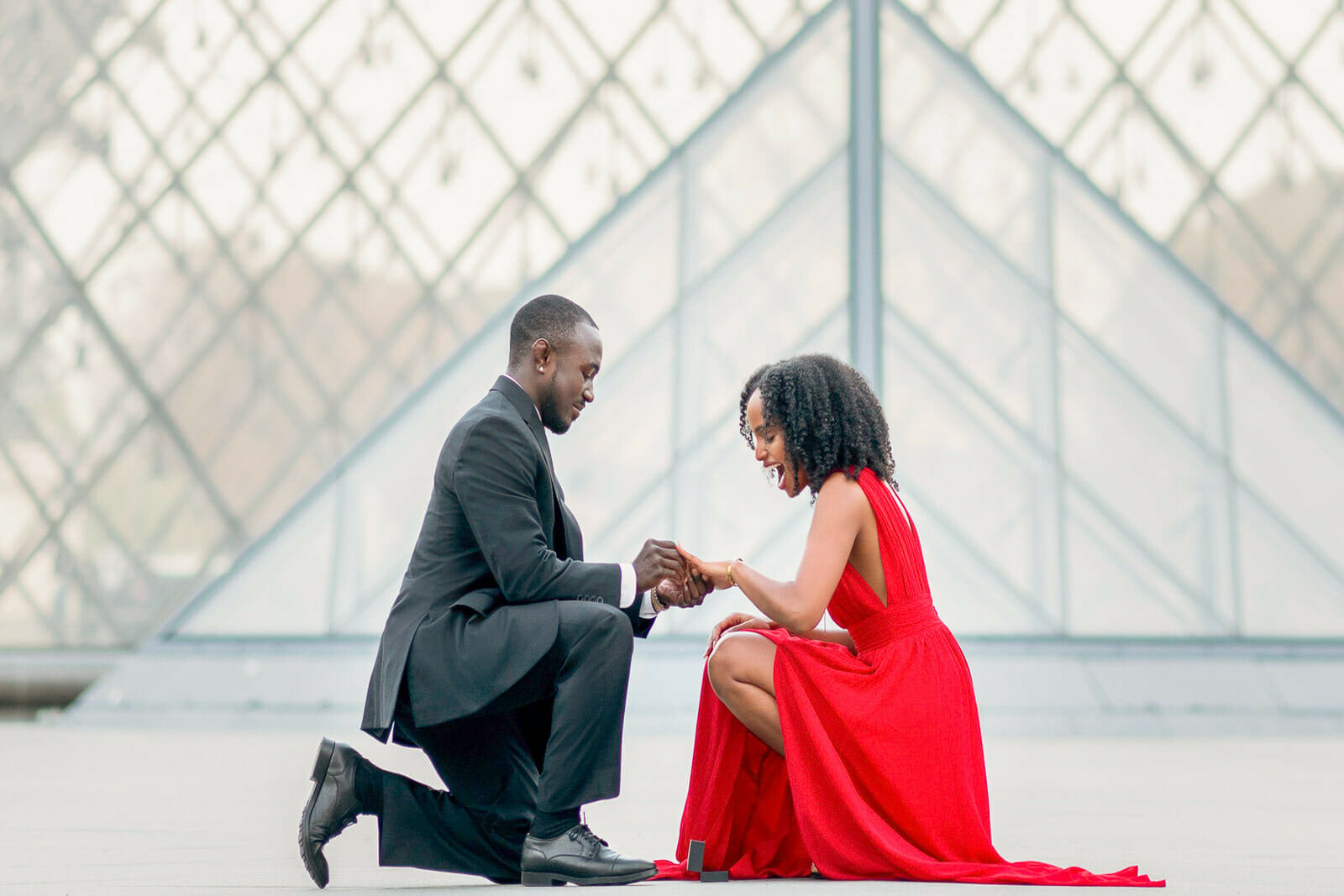 Paris proposal in front of the pyramid of the Louvre Museum