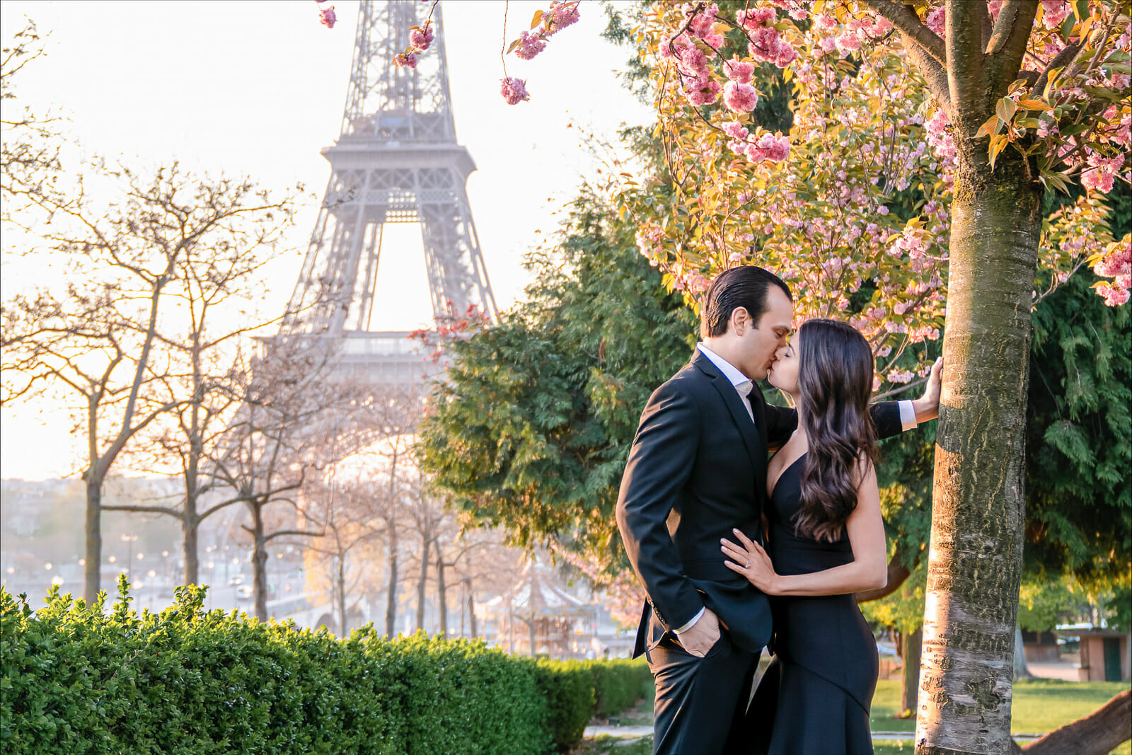 Paris engagement photos Cherry Blossom Season with Eiffel Tower as backdrop