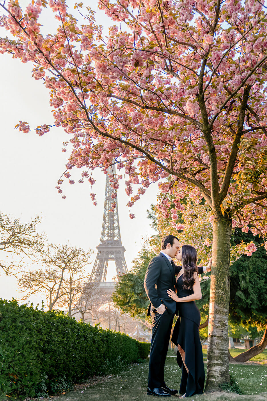 Paris engagement photos Cherry Blossom Season with Eiffel Tower