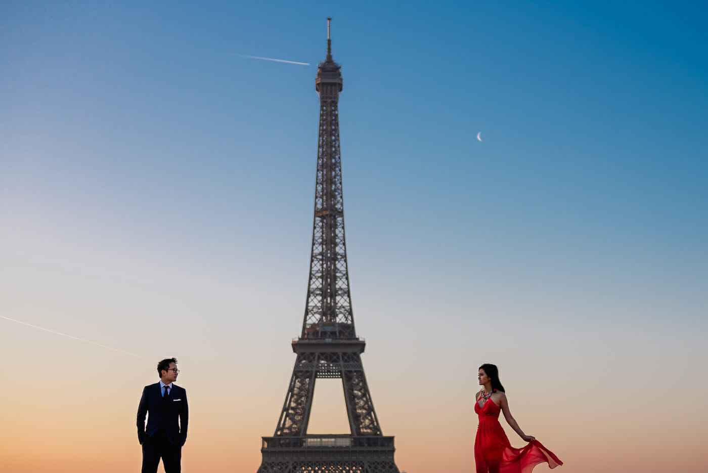 Creative couple Eiffel Tower engagement photos at Trocadero during sunrise