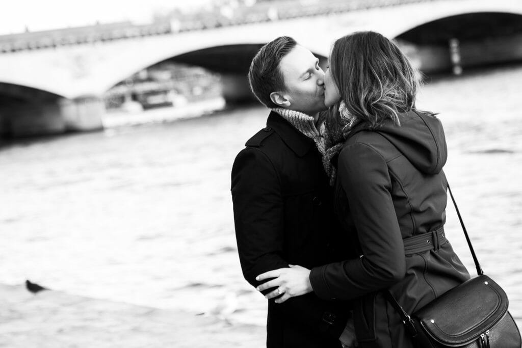 Paris engagement photos at the Seine River with Eiffel Tower view