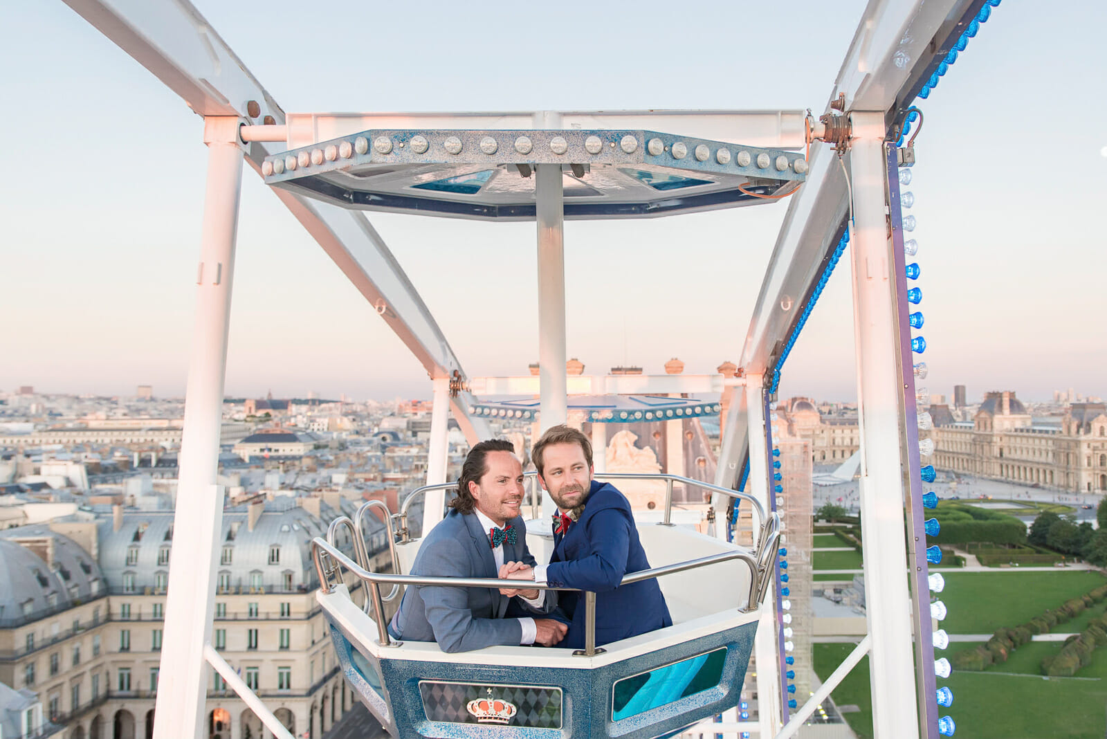 Same-sex Paris engagement photos near the Louvre Museum